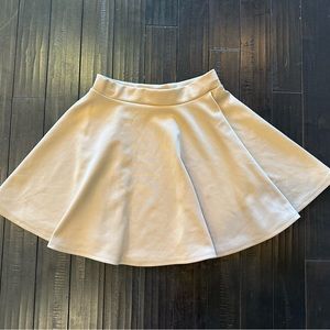 Flowy beige skirt women’s size XS.